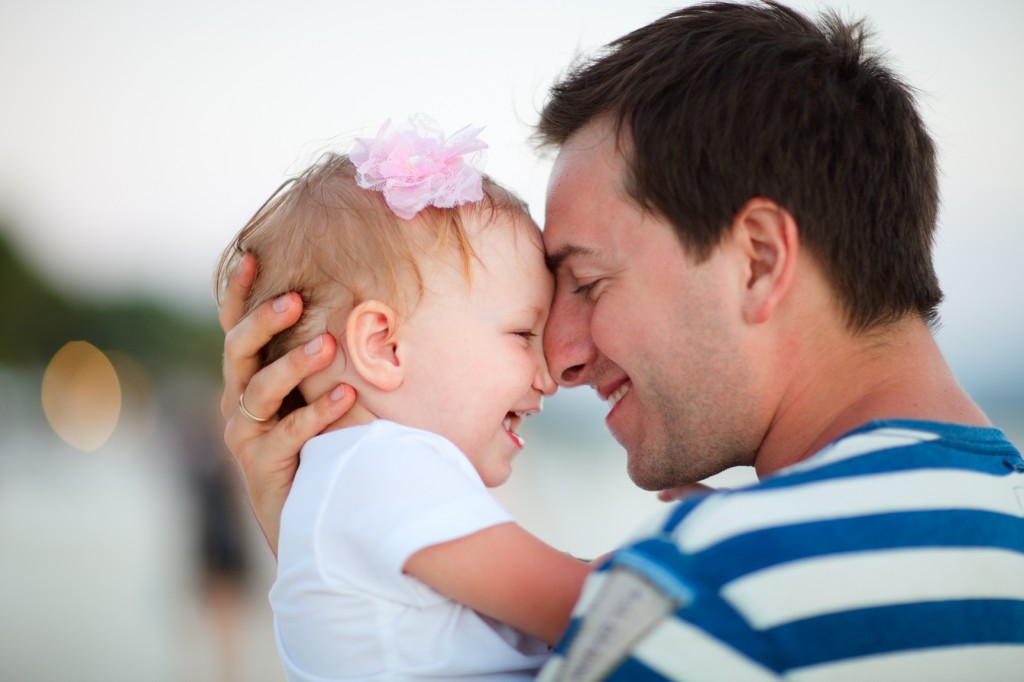 Father holding baby