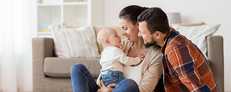 Family Spending Time with Baby in Living Room