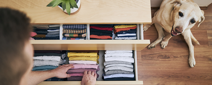 New Father Organizing Closet for Home Resolutions