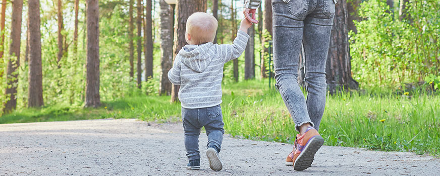 Parent Walking with Toddler
