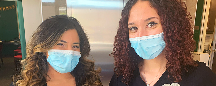 Two nurses at Red Rock Fertility Center wearing masks