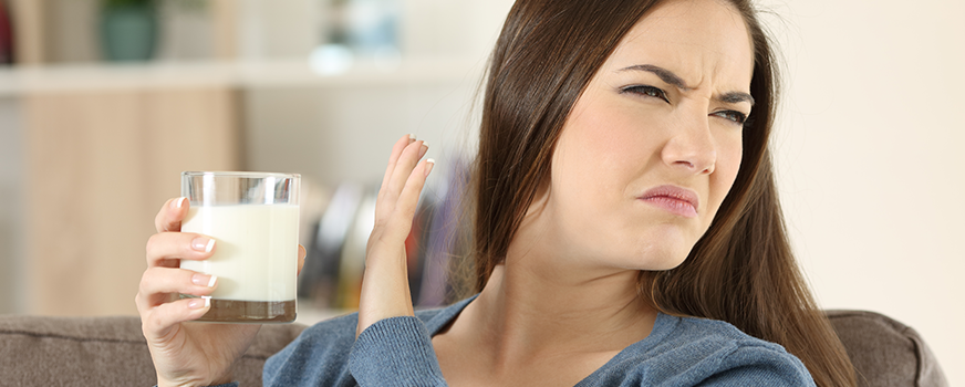 Woman Avoiding Drink Due to Morning Sickness Nausea