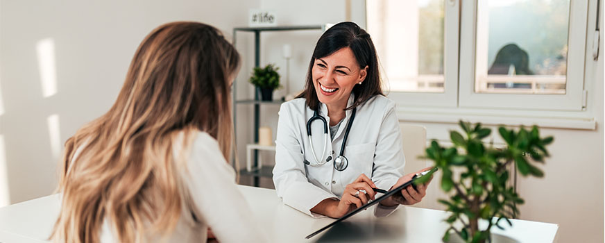 Woman Speaking to Doctor About Stopping Birth Control