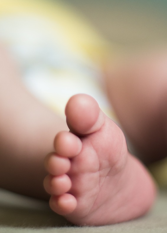 Closeup of newborn baby foot